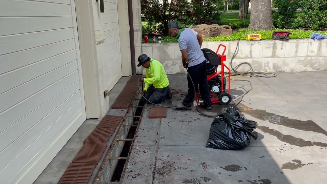 Cleaning a Landscape Drainage System with a Hydro Jetter
