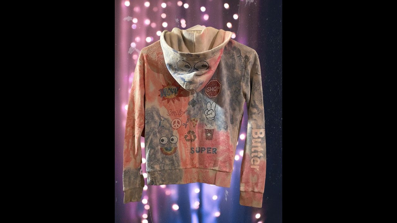 With its vibrant colors and unique bling design, this Butter girls tie dye hoodie is perfect
