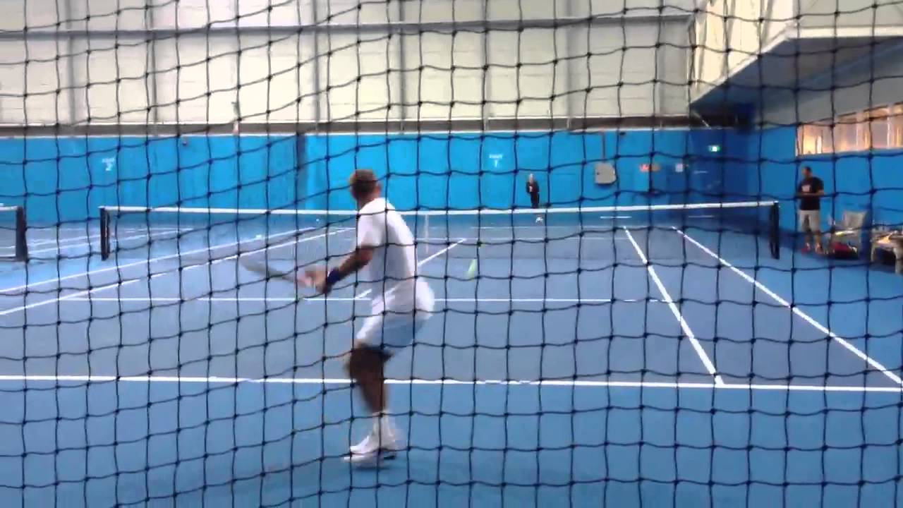Thomas Muster & Alina Jidkova hitting balls at Melbourne Pa