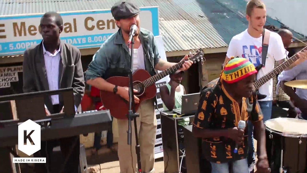 Woman No CRY as performed by Baba Gurston, Money Brothers and Made In Kibera Band at Kibera street