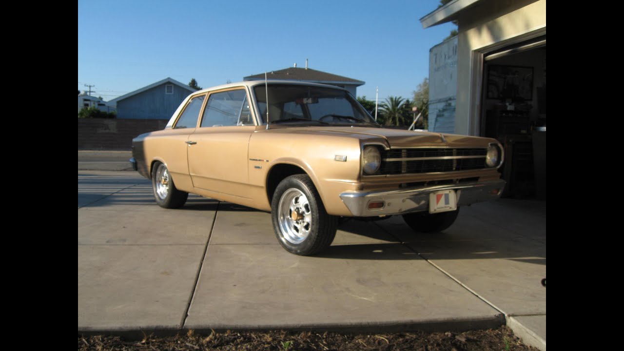 1969 RAMBLER CUSTOM FRONT BRAKE DRUMS GET MODIFIED TO FIT MAG WHEELS.