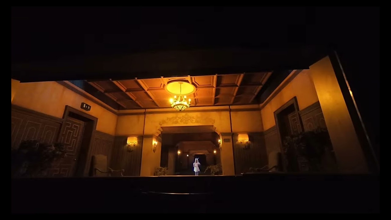 Tower of terror paris new dimension of chills hallway scene ghost girl gives us a present/gift. 