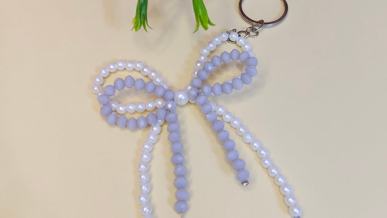 ميدليا فيونكه سريعه من الخرز الكريستال واللولي Quick bow medallion made of crystal beads and pearls 