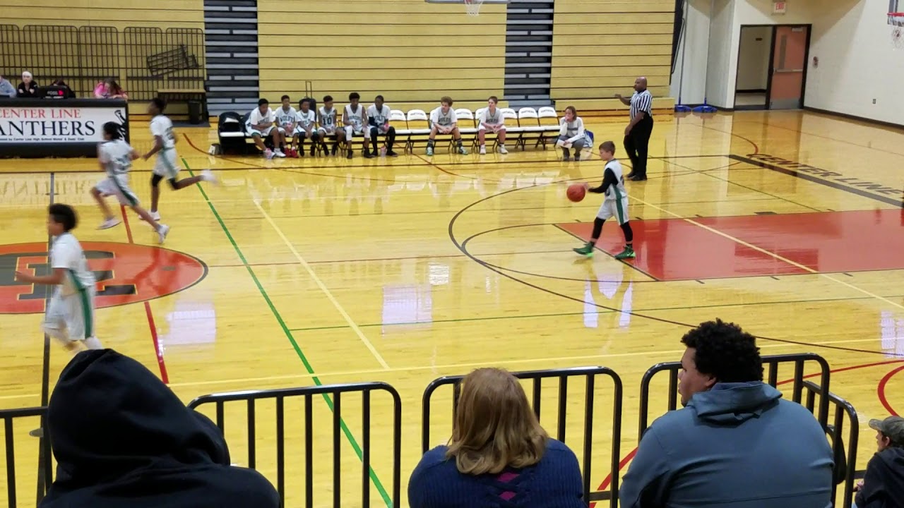 Wolfe takes the W(BASKET BALL AT CENTER LINE HIGH SCHOOL