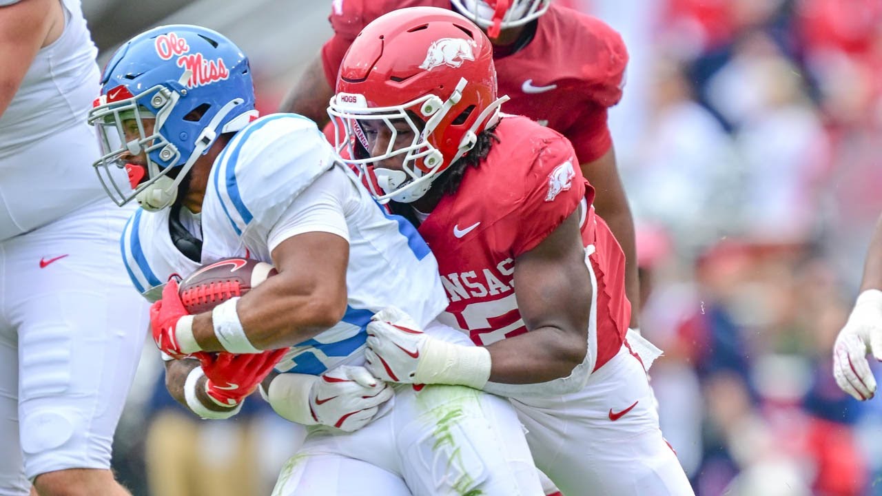 Razorbacks' offense lineman Fernando Carmona, linebacker Brad Spence