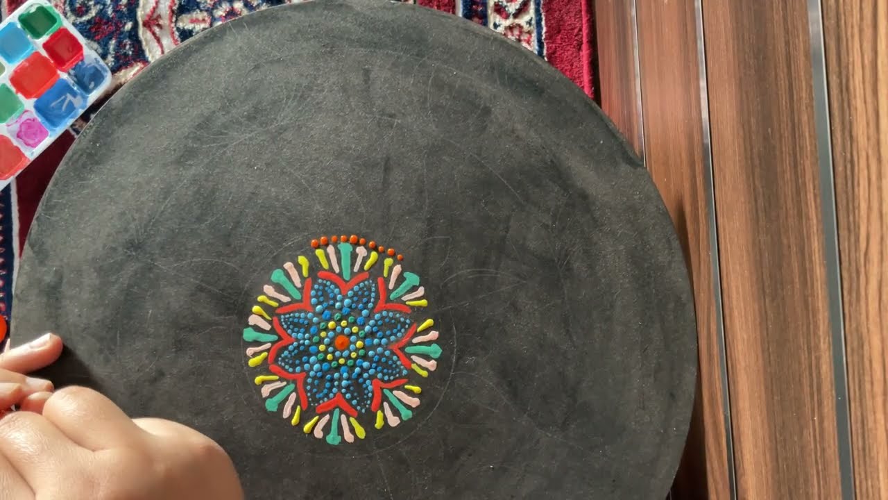 Watch the magic unfold.The satisfying process of my latest colourful mandala with a black background