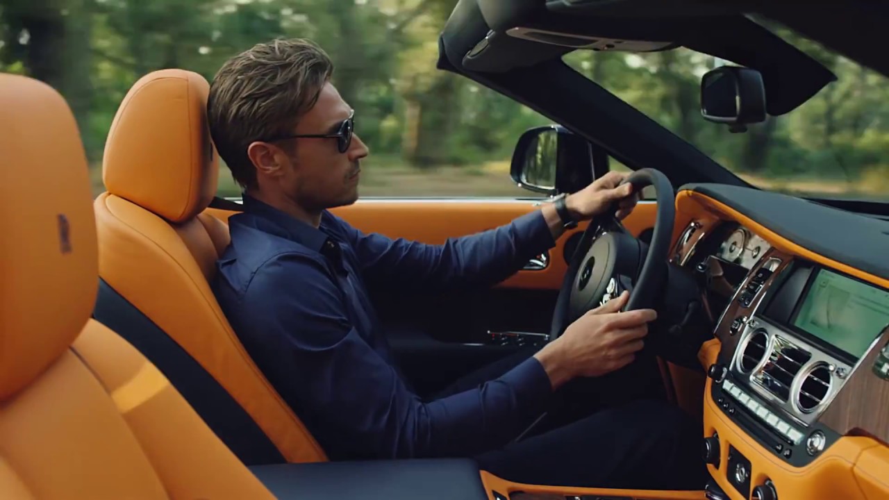 Introducing Rolls-Royce Dawn. Experience open-top driving like never before.