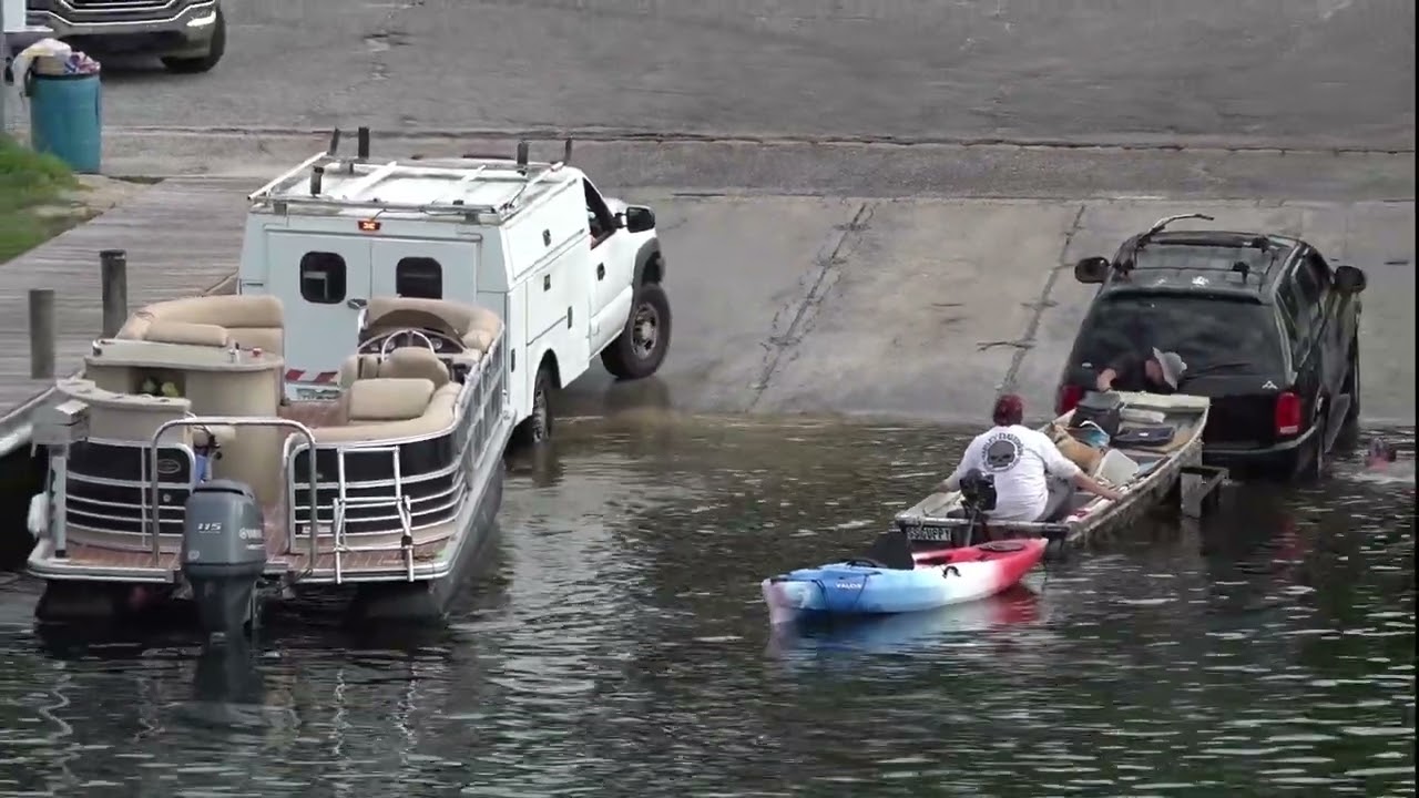 Pontoon nearly ROLLS OFF TRAILER