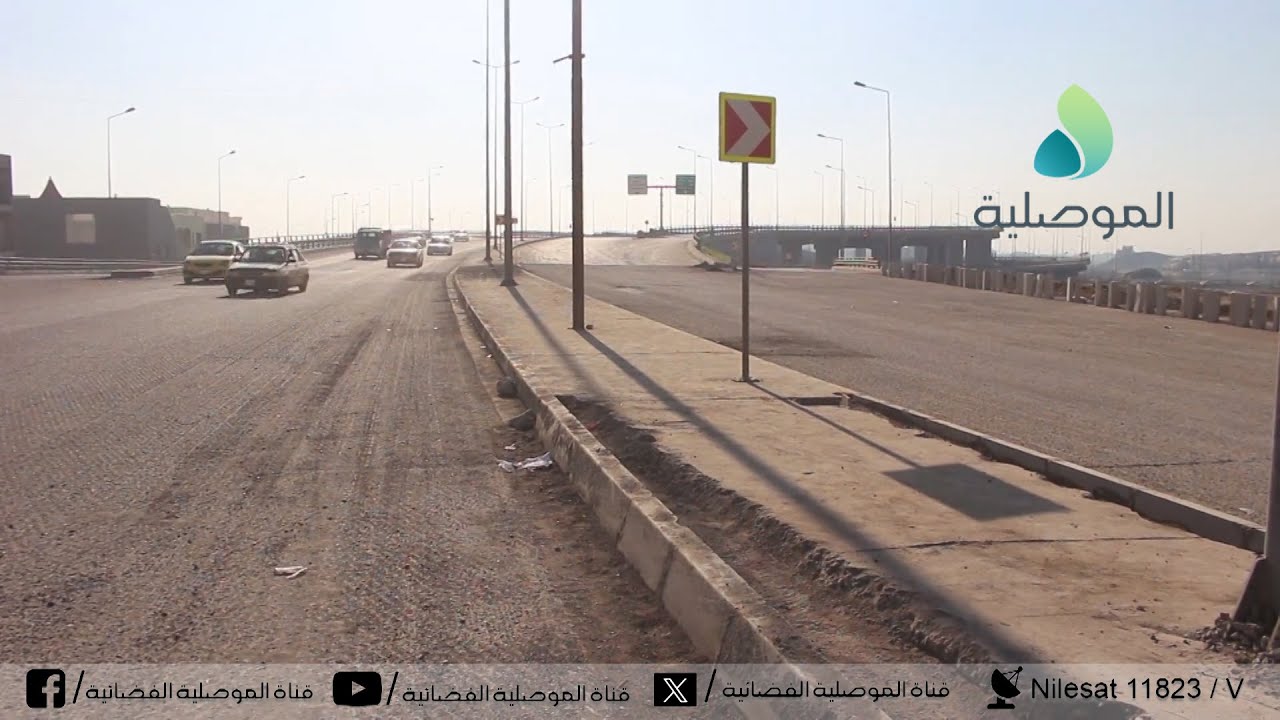 استمرار الاعمال بمجسر حاملة الجرار بايسر الموصل بعد قشط الشارع الممتد الى مجسر المثنى من اجل تبليطه