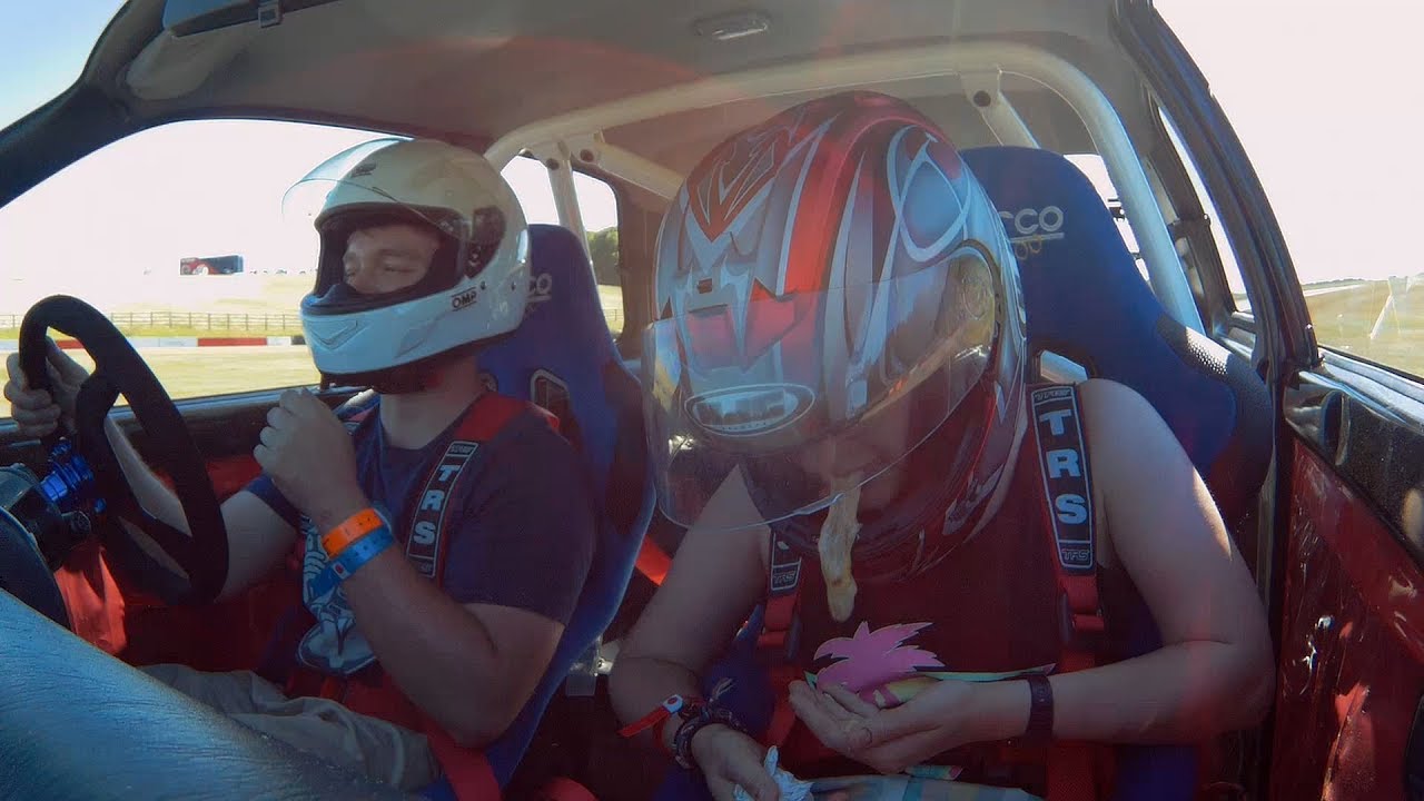 Girlfriend throws up in helmet on track