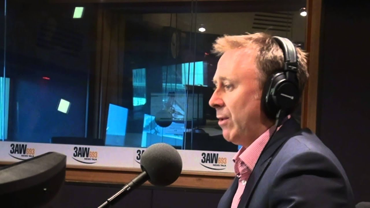 AFL Players' Association chief Matt Finnis with Justin Smith
