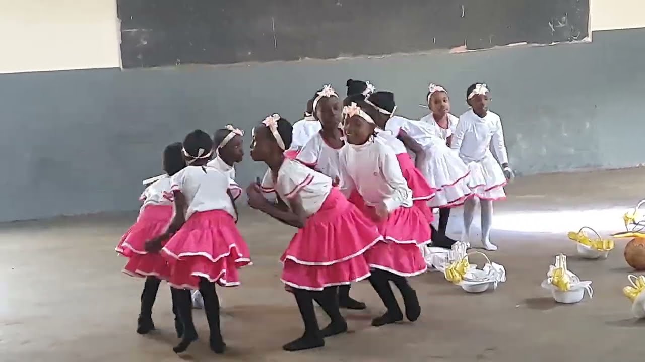 Father Oucho Primary School performing a singing game