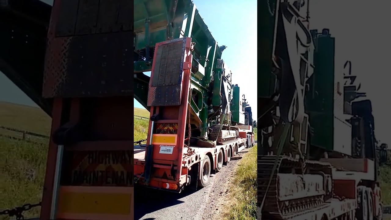Восстановление загруженного низкорамного прицепа, застрявшего на склоне