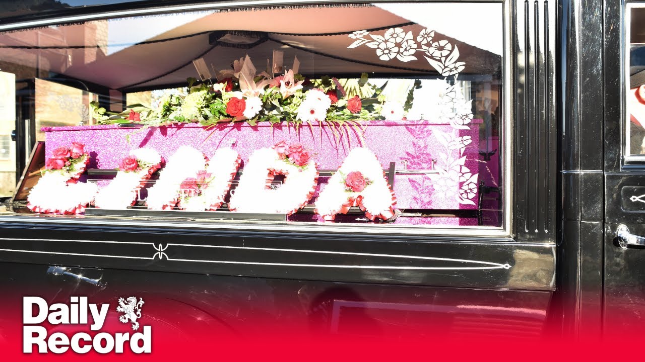Linda Nolan's funeral features pink sparkly coffin as sisters lead mourners