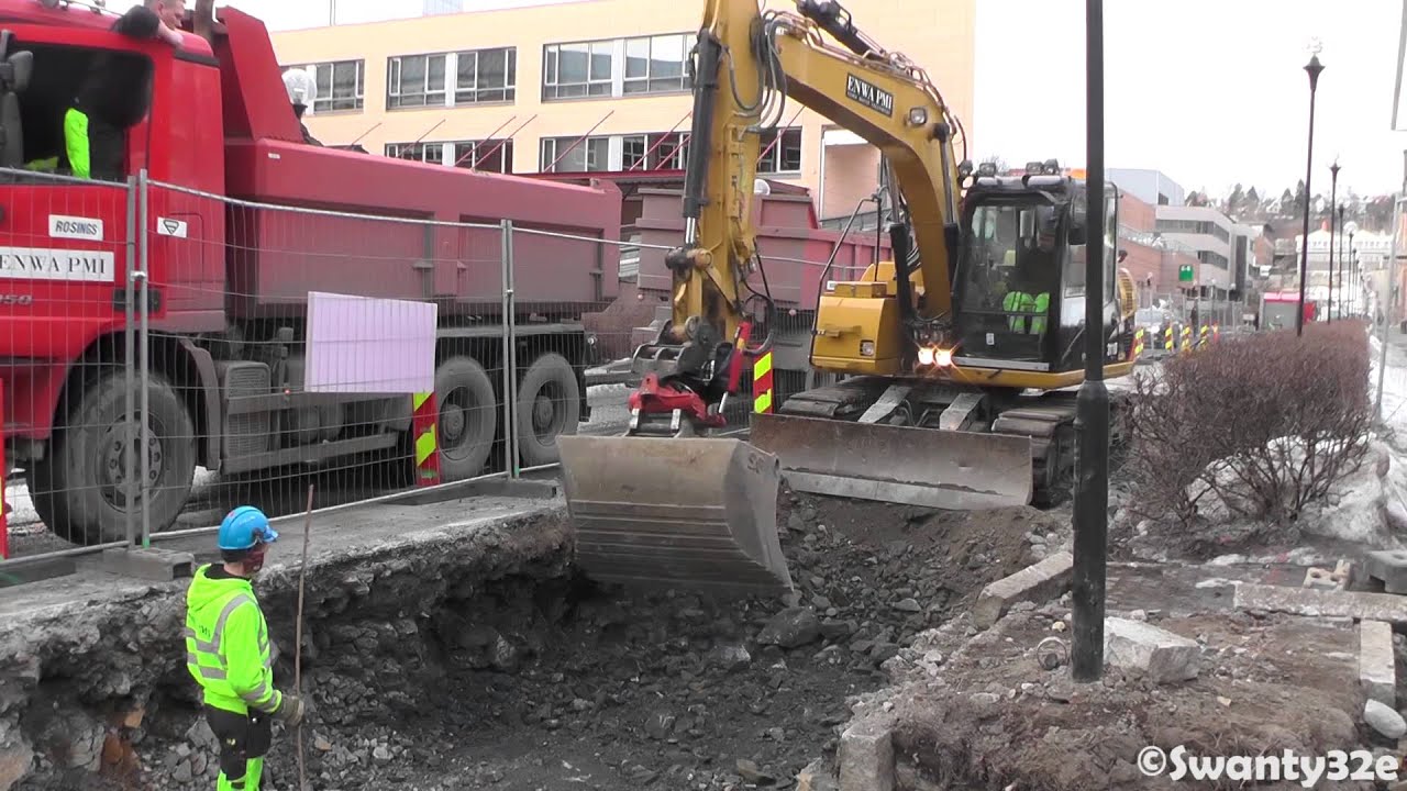 CAT 311D LRR Loading Truck & Digging