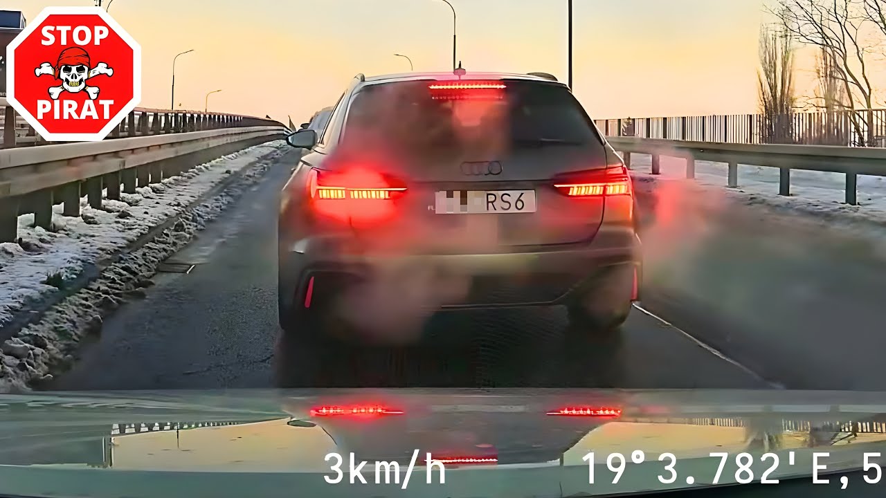 Szeryf w Audi zajeżdża drogę i blokuje ruch, w konsekwencji potęgując zator na pasie. STOP PIRAT