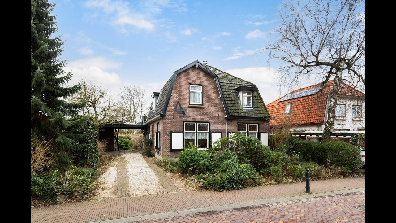 Henk Bos Makelaardij - Karakteristieke levensloopbestendige woning aan Spoorstraat 27 in Lunteren!