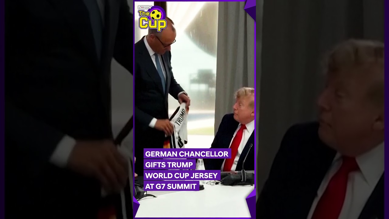 German Chancellor Gifts Trump World Cup Jersey At G7 Summit