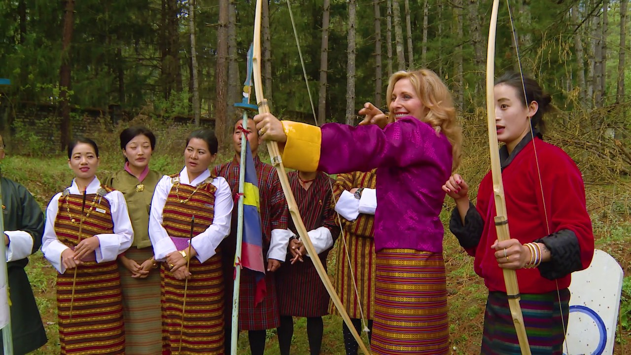 Bhutan - Linda Swain Plays archery with Olympian Archer, Karma