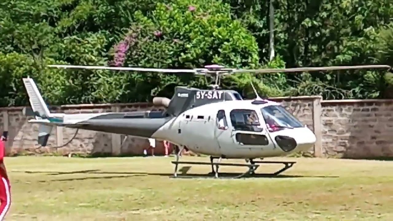 Helicopter takes off at Karen, Nairobi, Kenya, St. Hannah's Primary School