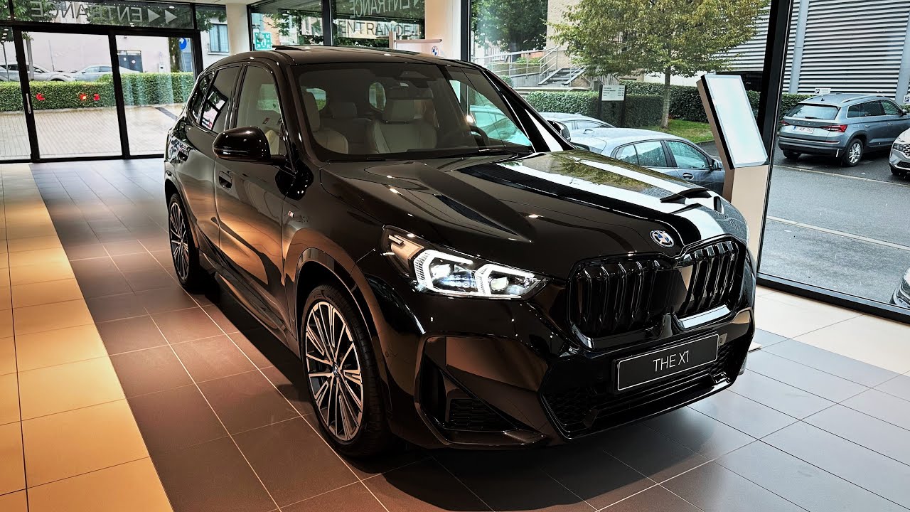 2023 BMW - The iX1 xDrive30 - Beautiful black and white interior - exterior view