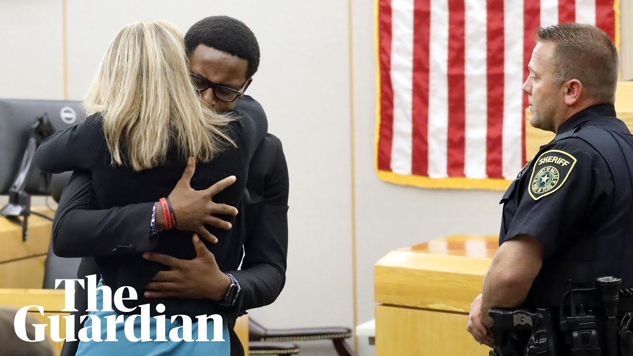 Botham Jean's brother hugs ex-officer Amber Guyger after sentencing