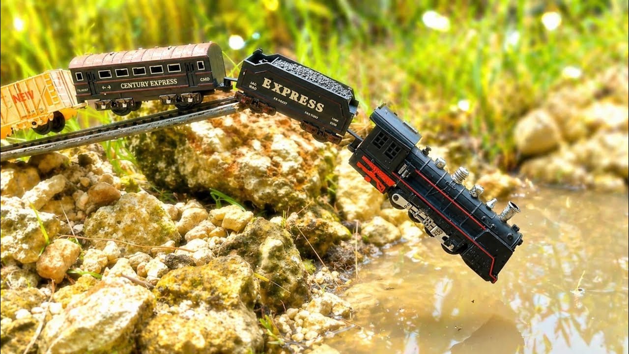 Steam train plunges into river