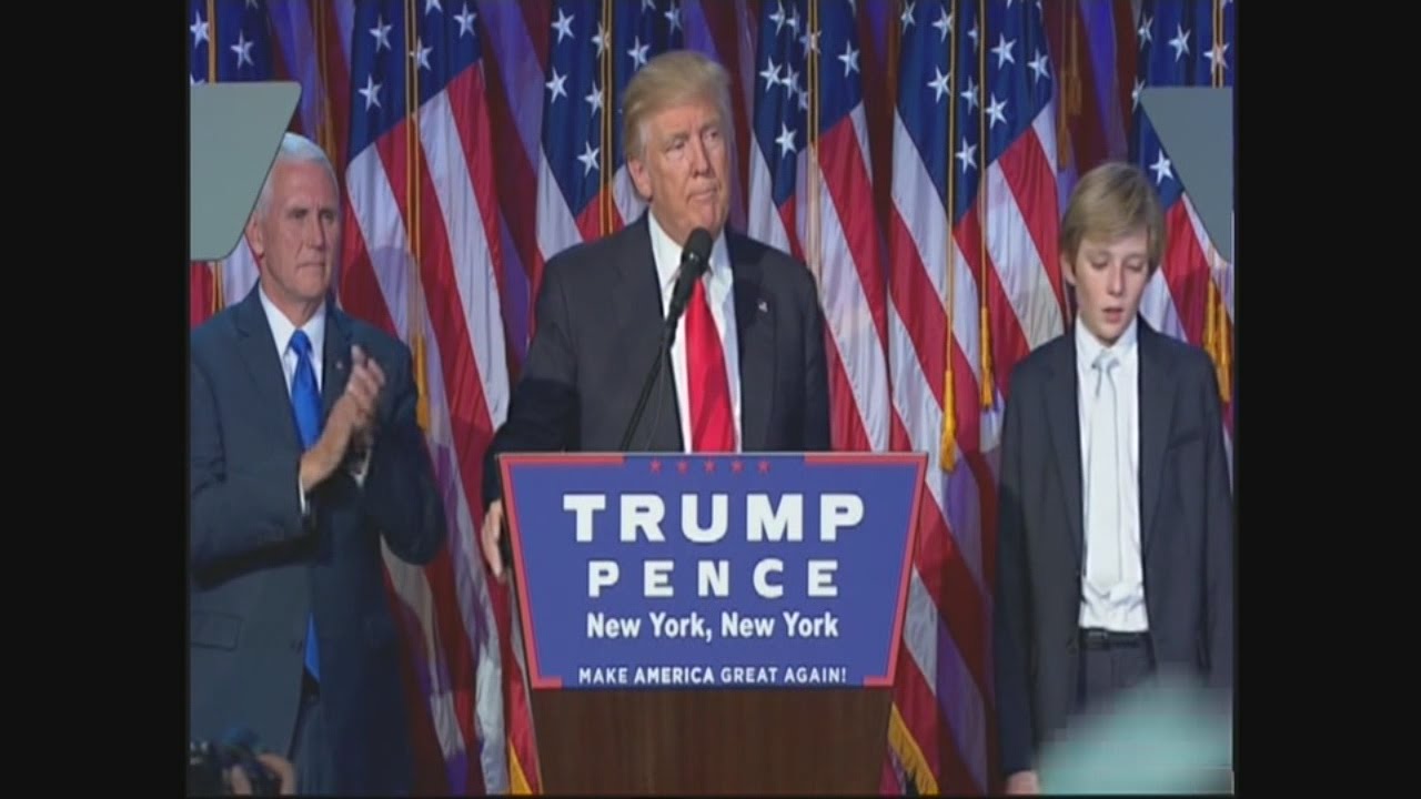 Barron Trump struggles to stay awake during Dad's victory speech