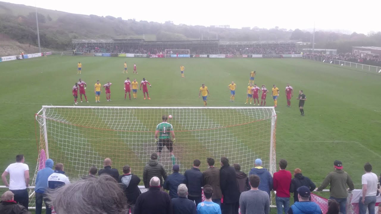Matt Rhead scores a penalty and tells abusive fans to be quiet....