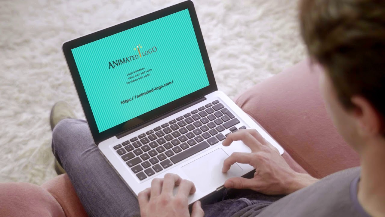 A guy  Using  Macbook Pro laptop  business video logo animation advertisement/commercial