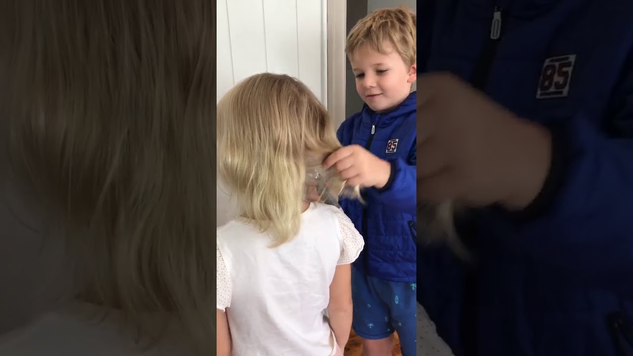 When did you EVER see a brother brushing his little sister's hair?