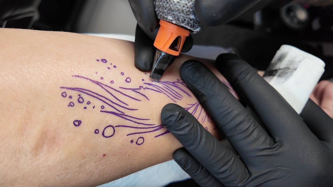 WATERCOLOR FEATHER TATTOO