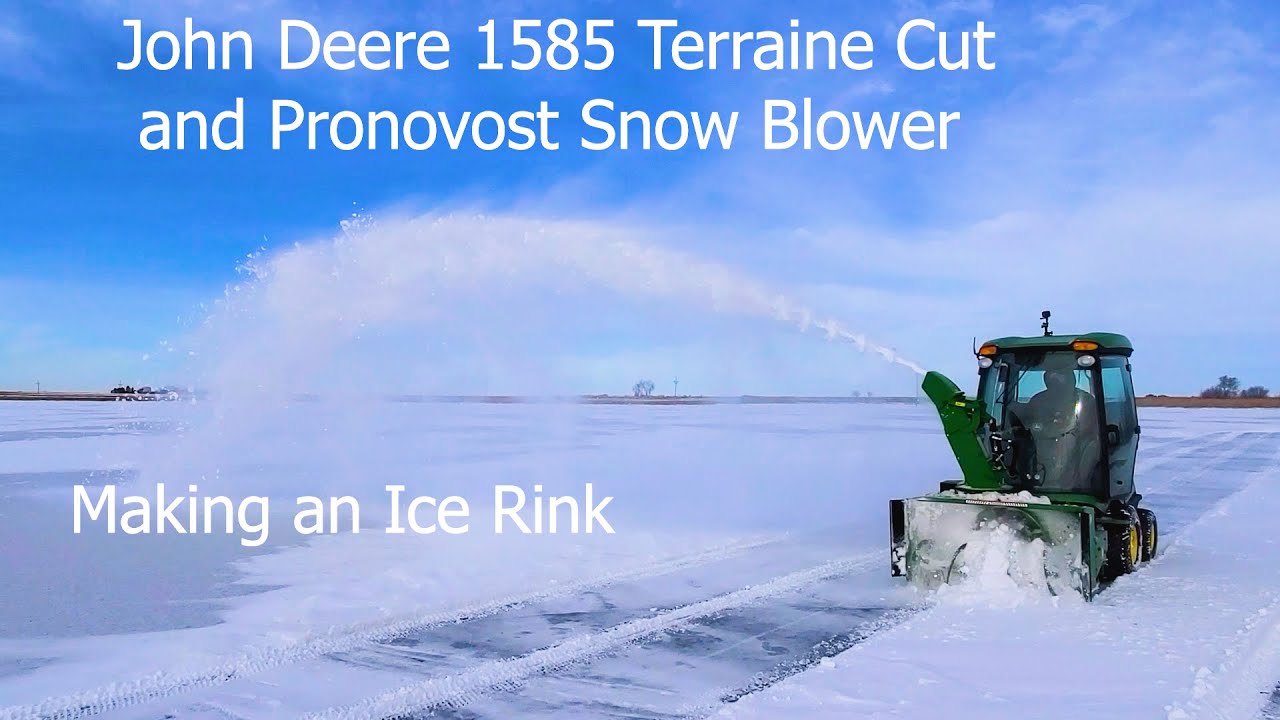 John Deere 1585 Terraine Cut with Pronovost Snow Blower and Tool Cat 5600 with 68