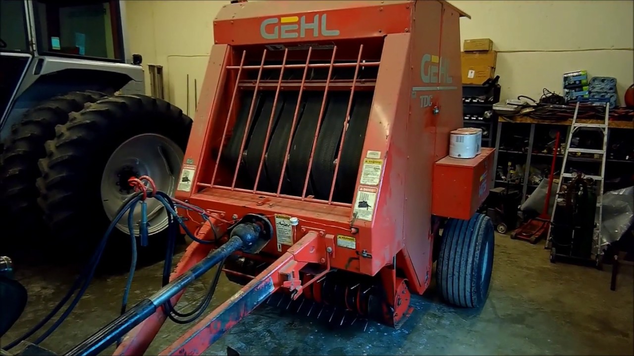 Relacing a round baler belt Gehl 1475