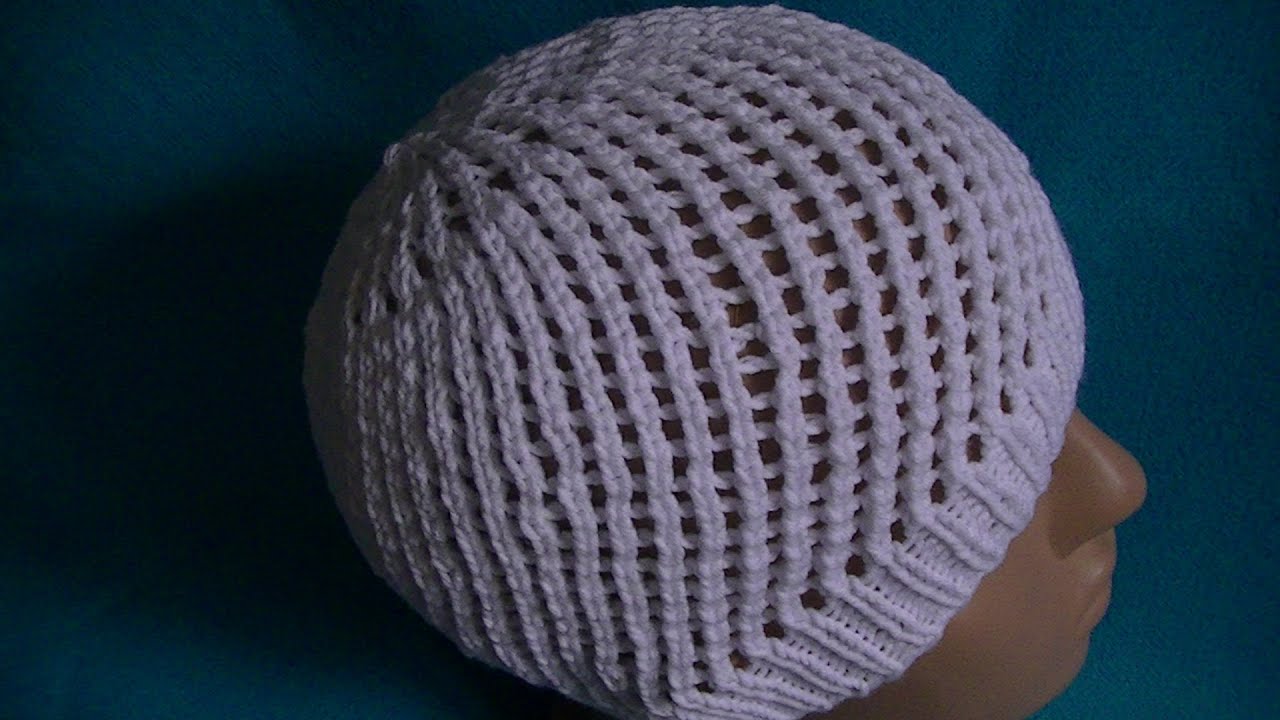 Вязание ажурной шапочки на круговых спицах.Knitting lace cap on circular needles.