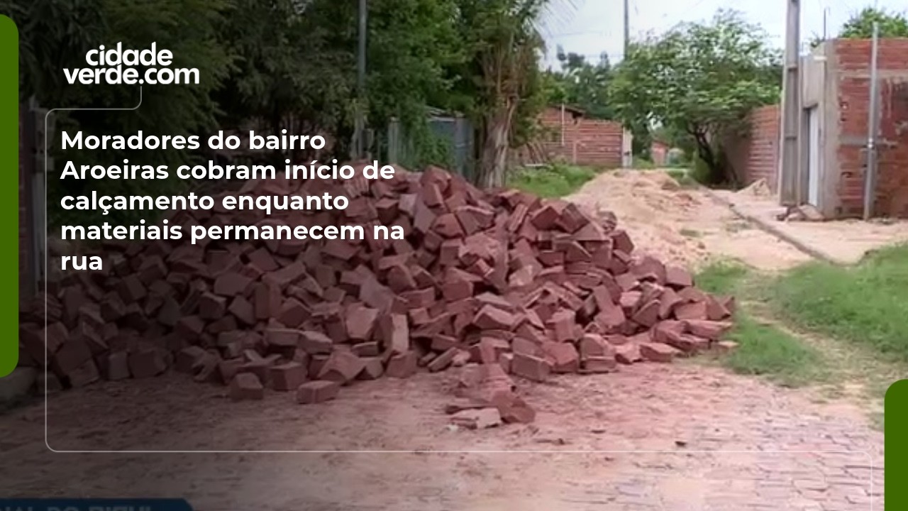 Moradores do bairro Aroeiras cobram início de calçamento enquanto materiais permanecem na rua