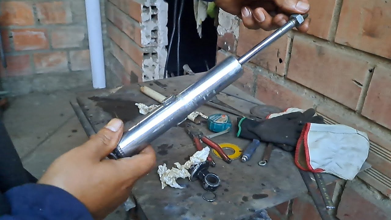 2da parte reparación completa de amortiguadores mono show de mocicleta  150cc