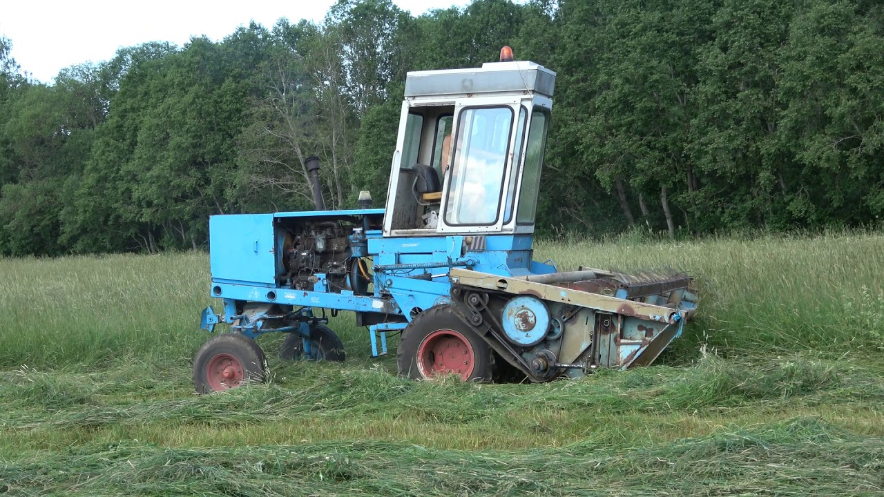 Fortschritt E 301 is mowing hay
