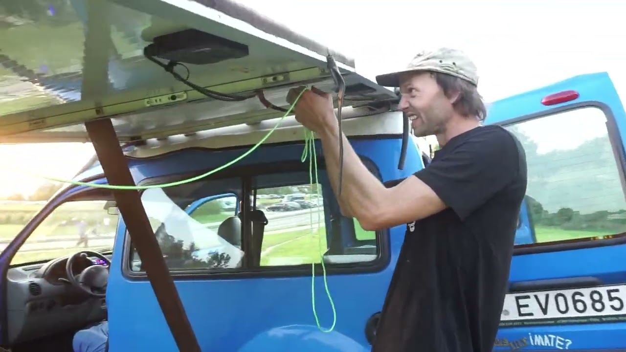 Folding solar panel system for van roof top.