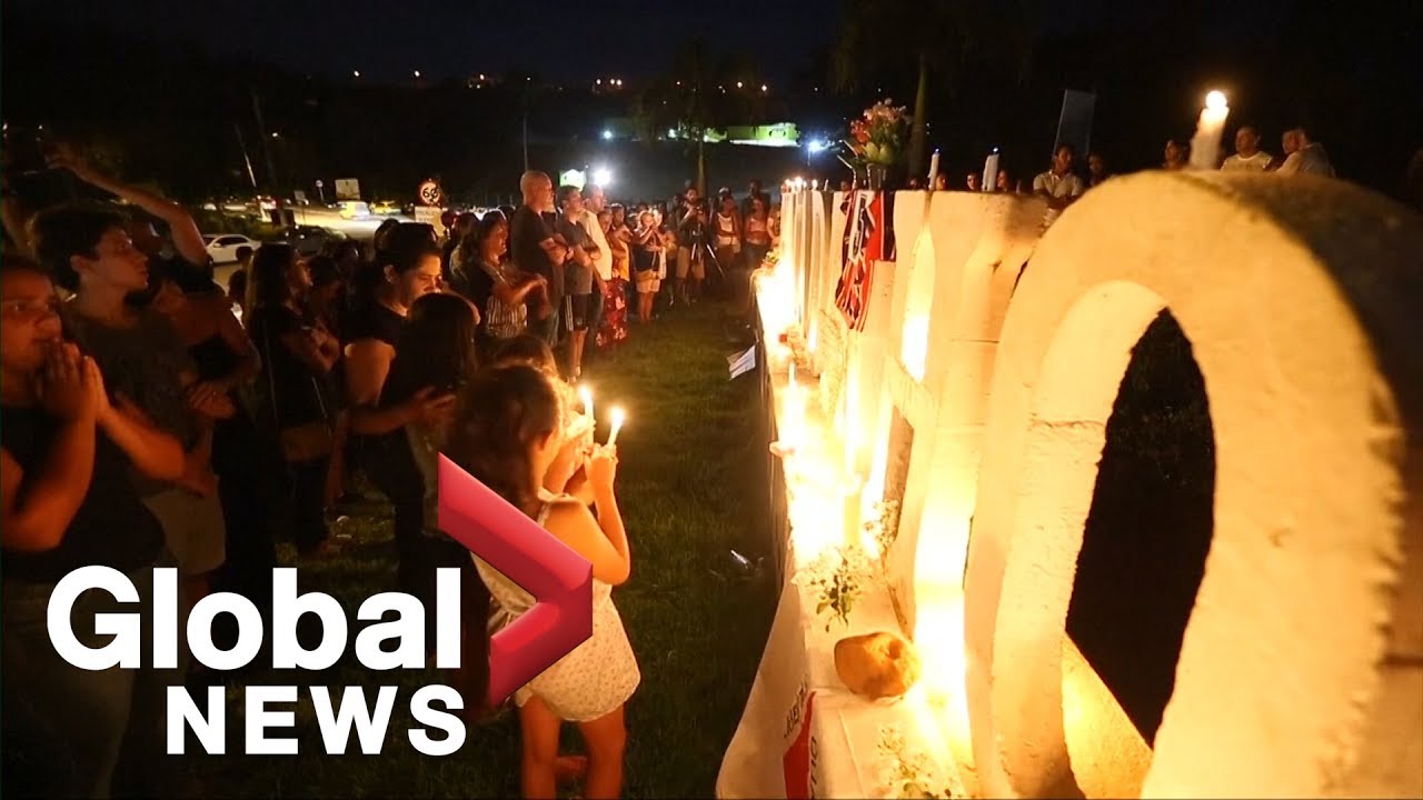 Brazilian town mourns dam collapse victims at candlelight vigil