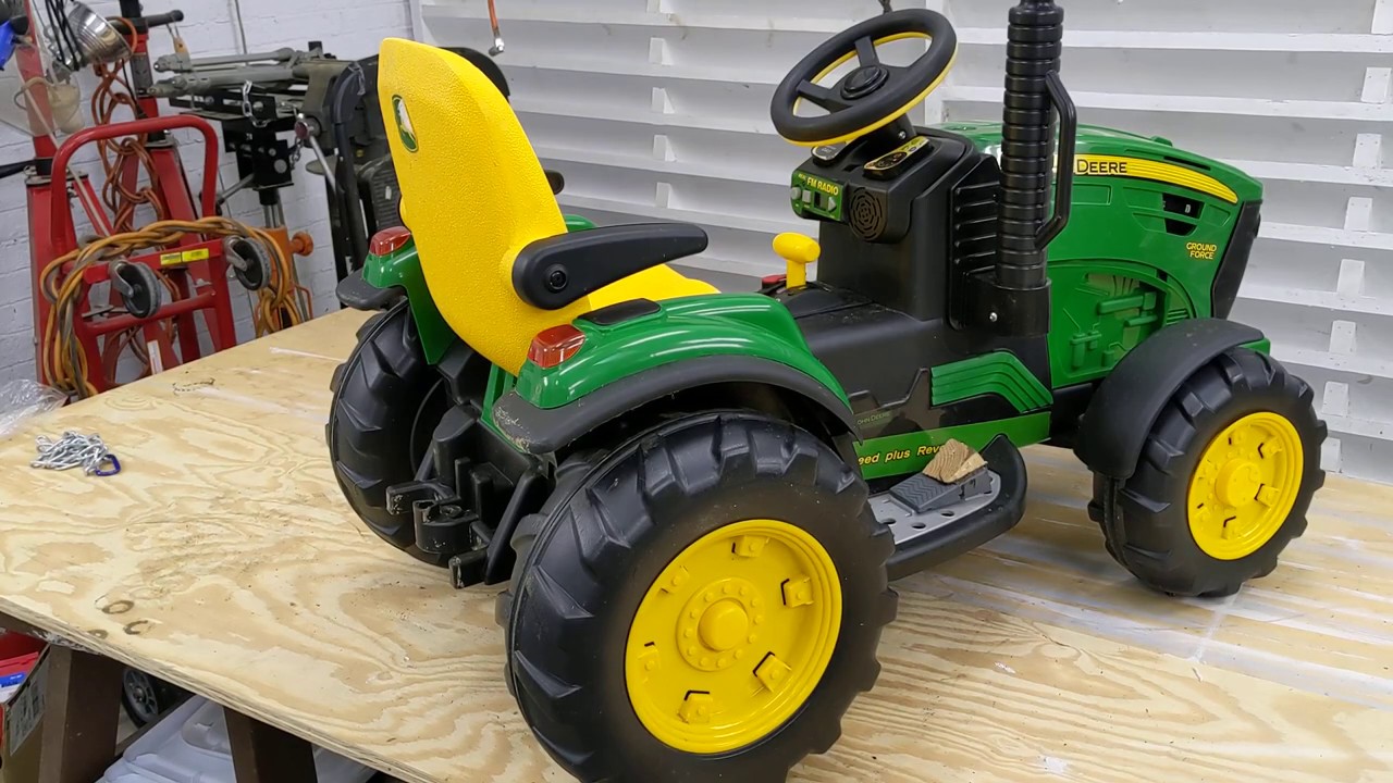 Troubleshooting and repair of battery powered riding toy tractor, lifting with 2 ton cap chain hoist