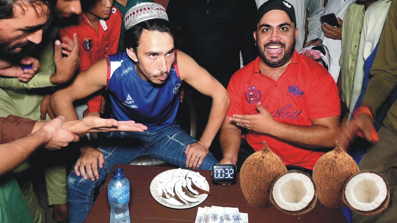 Coconut ( Narial ) Eating Contest at Barkat Market Lahore