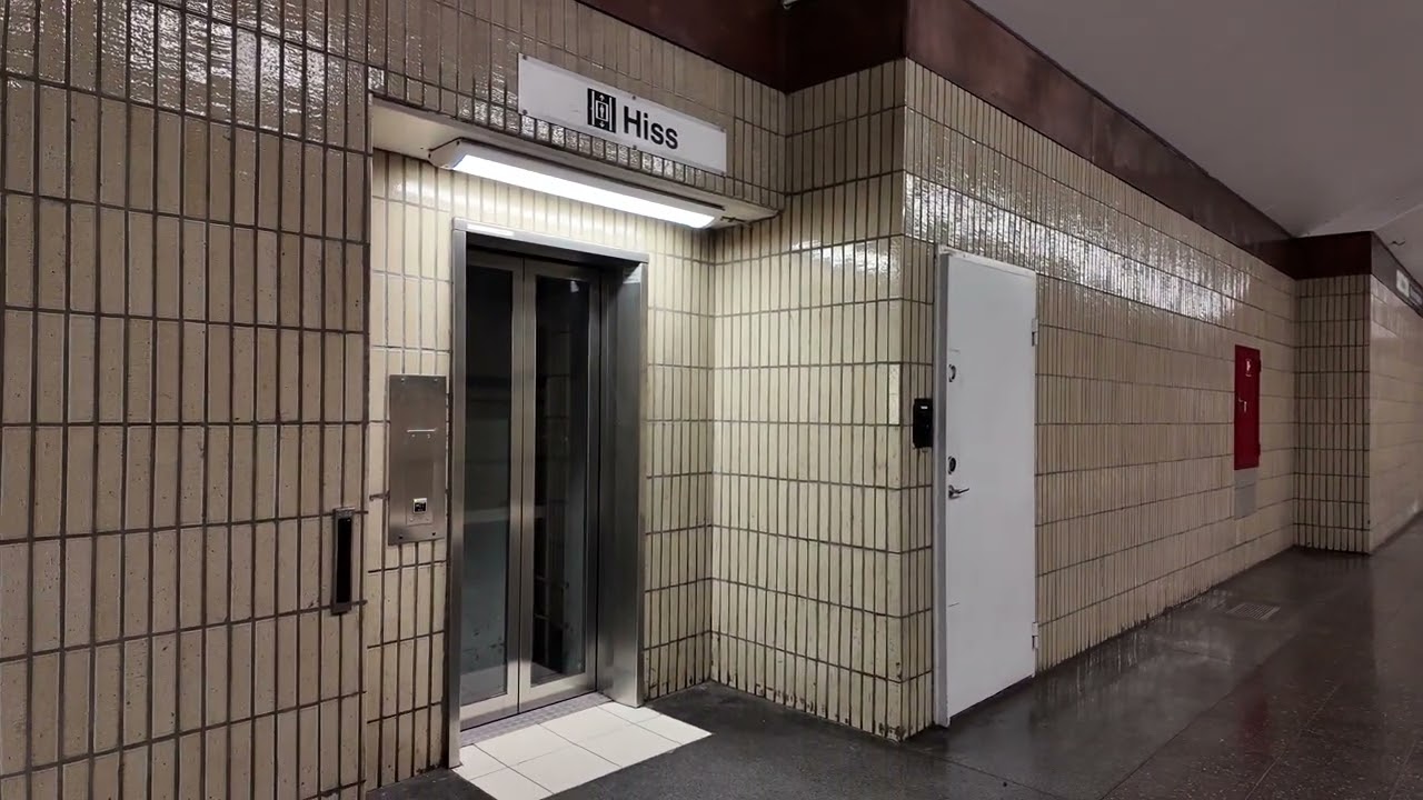 Sweden, Stockholm, Midsommarkransen Subway Station, 2X escalator, 1X elevator
