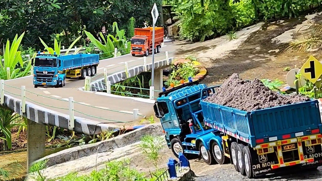 AKSI KE 99 ‼️ Proyek Pembangunan Jalan Rc Truk Trailer vs Tronton Angkut Pasir Selip Ban Terglincir 