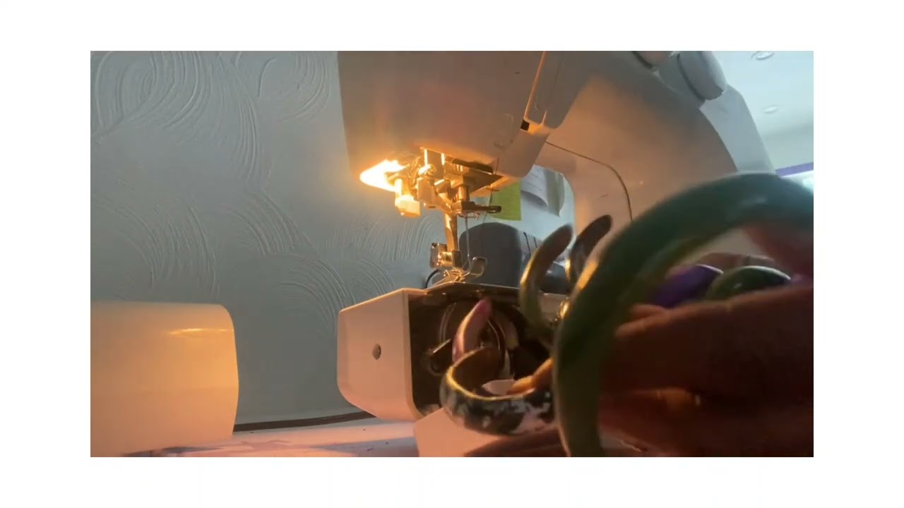 Inserting a new bobbin into a sewing machine 