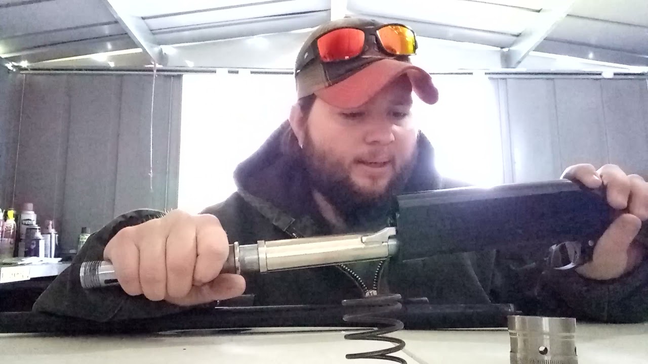 a symbol and disassemble 12 gauge Hatfield shotgun
