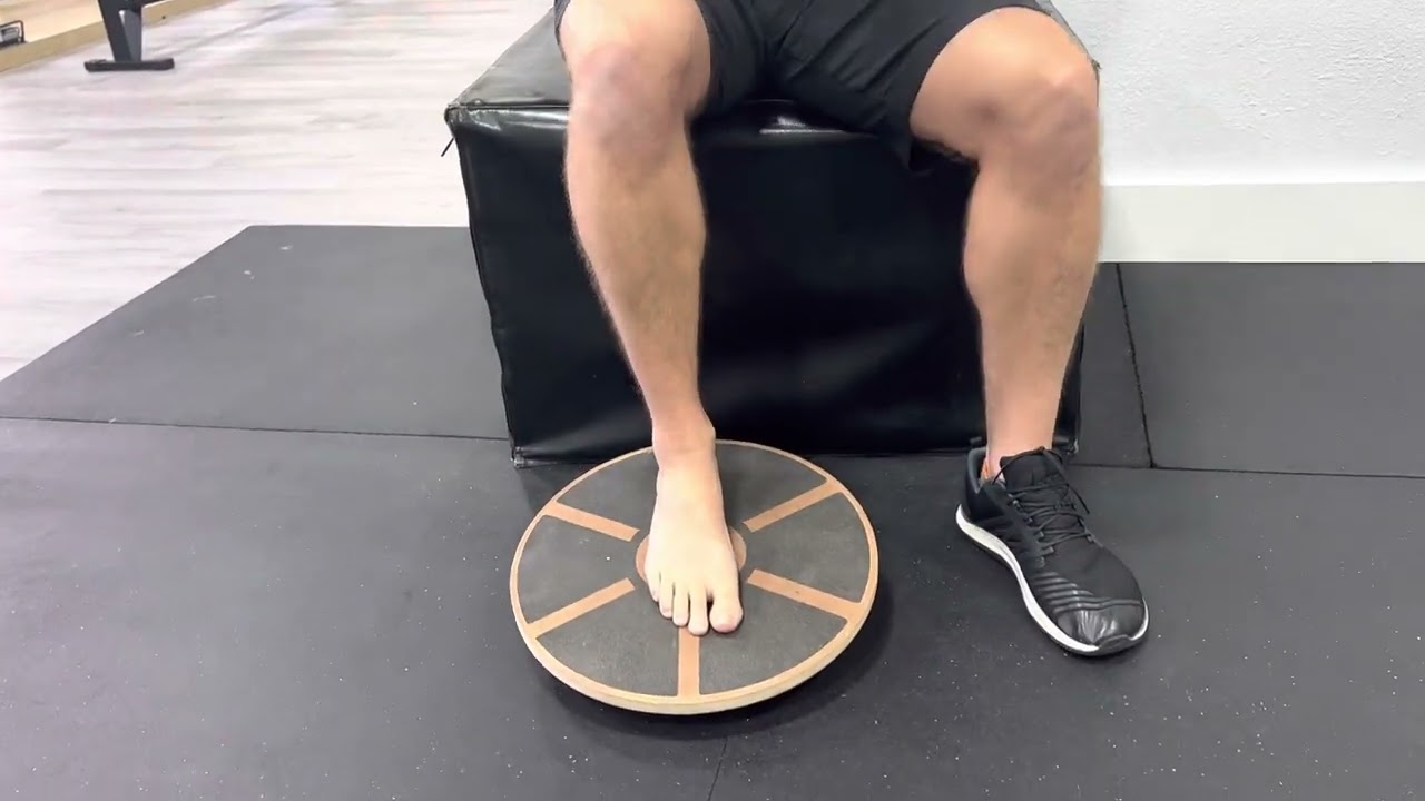 Ankle stability exercise -wobble board plantar flexion/dors flexion