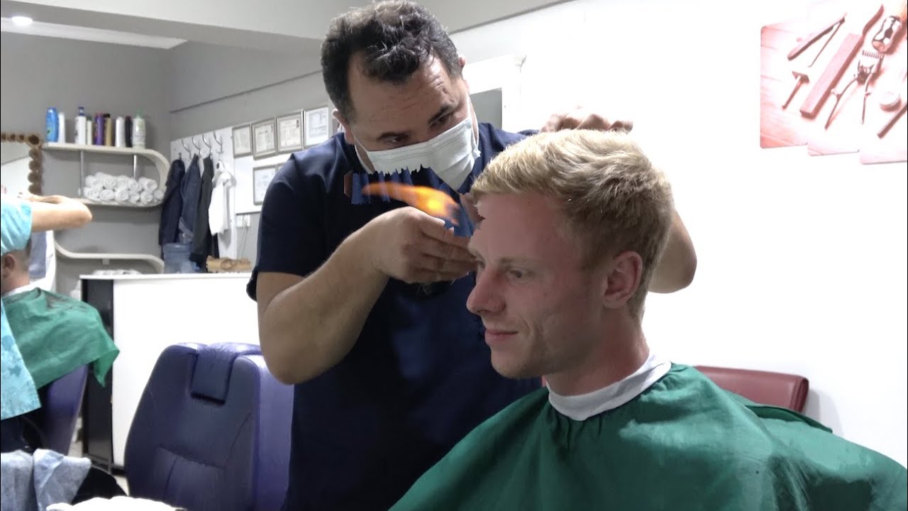 Turkish haircut with fire in Fethiye, Turkey