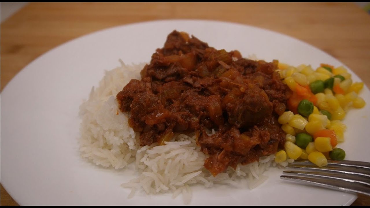 Rich And Flavorful Beef Tomato Stew On Rice