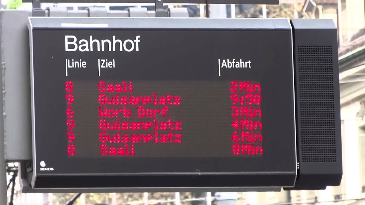 Streetcars and buses at the central station Bern 2